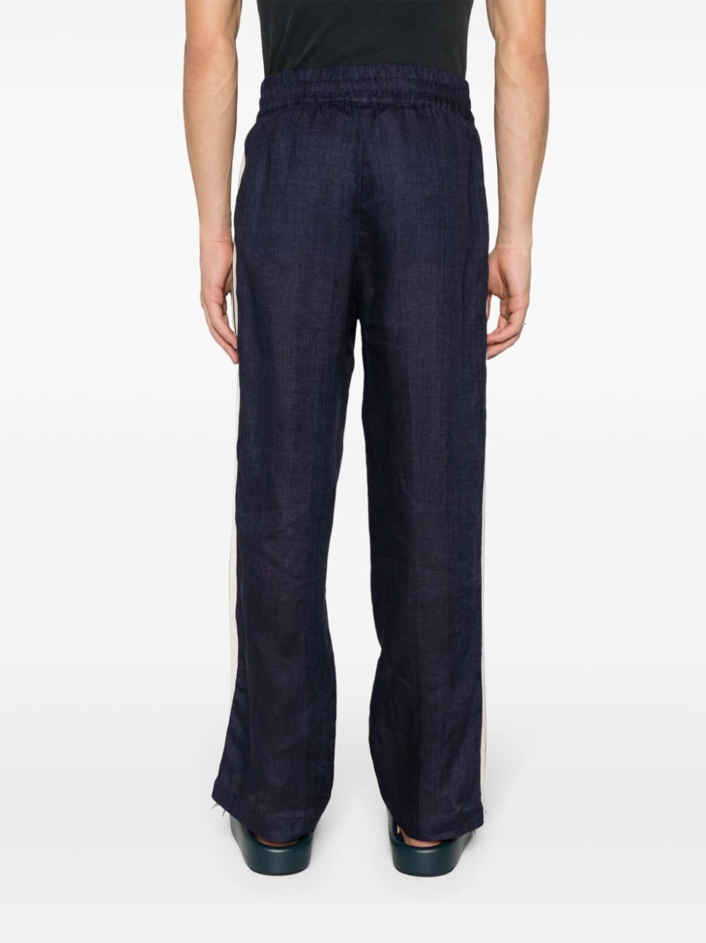 Palm Angels Conscious Criteria page Logo track pants
