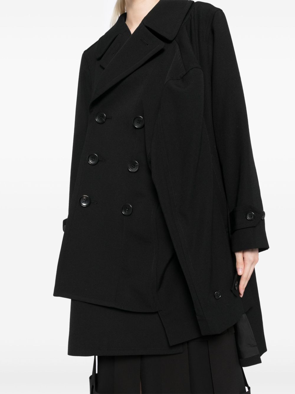 Comme Des Garcons Complete with asymmetrical sleeves